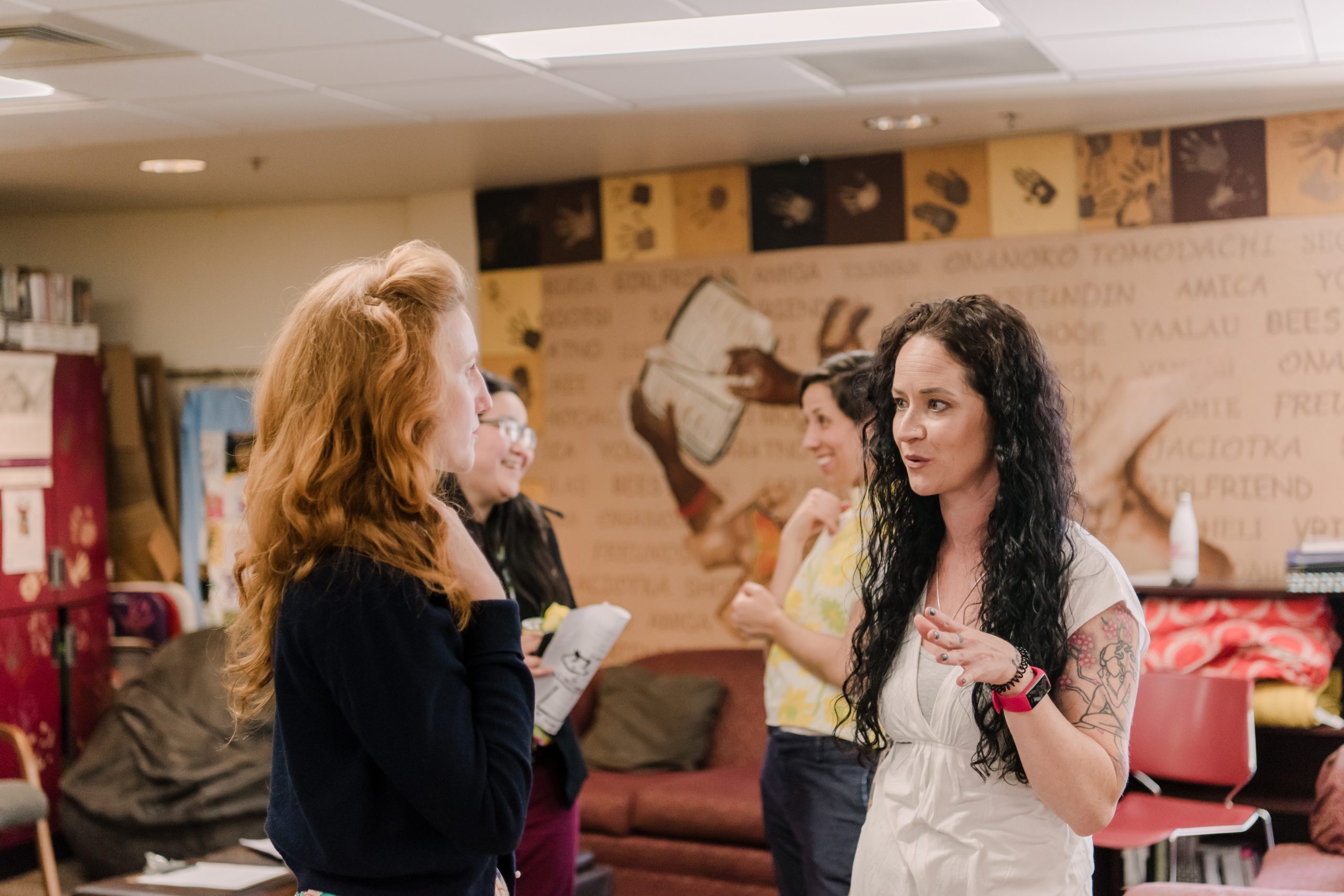 Two students in conversation in the Women's Center