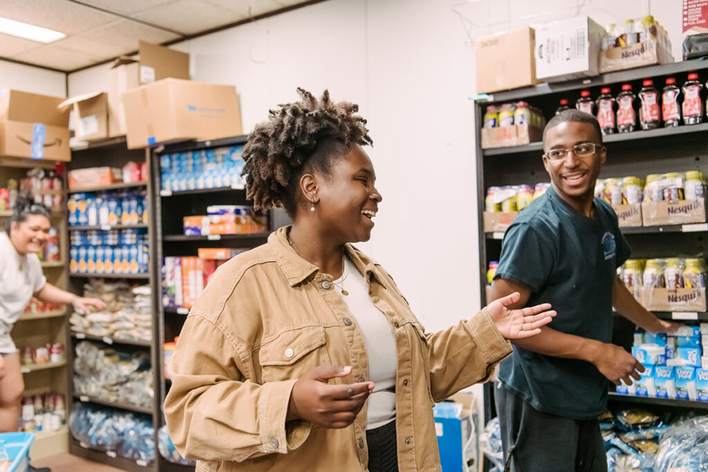 umbc volunteers in the food pantry